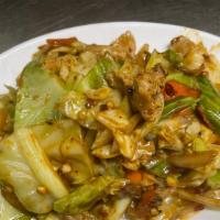 Twice Cooked Pork。回肉 · Served hot and spicy. Thinly sliced pork with chinese green cabbage.