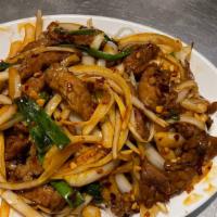 Mongolian Beef 蒙牛 · Hot and spicy. Sliced tender beef sauteed with green and white onions garnished with
crispy ...