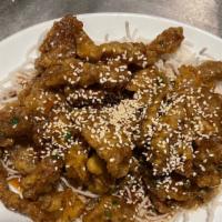 Sesame Beef。芝牛 · Deep fried beef with ginger candy coating.