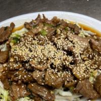 Palace Beef 韩牛 · Stir fried sliced of sirloin beef marinated in special Mandarin sauce, garnished with sesame...