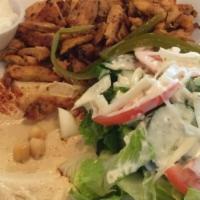 Chicken Shawarma · Favorite. Thin, shaved chicken slices off the rotating roasted cone and garlic dip. Served w...