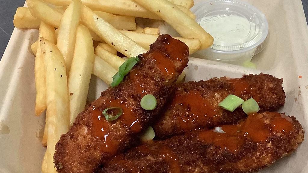 Chicken Strip Basket · Three piece hand breaded chicken with fries and choice of sauce.