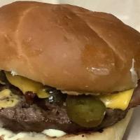Bacon Jalapeño Cheeseburger · 1/4 lb burger with bacon, jalapeños, melty cheese, lettuce and tomato, onion, pickle and hou...