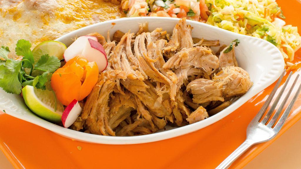 Pulled Pork Carnitas · Slowly cooked, slightly shredded, delicious pork. Served with guacamole, pico de gallo and tortillas.