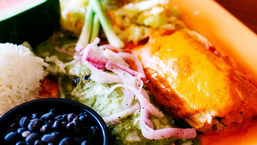 Tamal Rojo & Enchilada · Chicken tamale made from homemade red corn masa, served with a chicken enchilada topped with melted cheese and our creamy poblano suiza sauce.