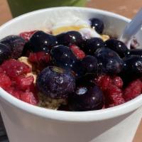 Acai Berry · Raspberries, blueberries, banana, acai juice, granola, fresh yogurt, and honey.