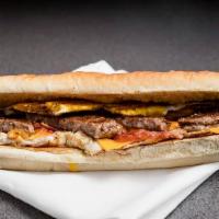 The Crew Breakfast Sandwich · Most popular. Three eggs, bacon, sausage on a footlong hero roll with butter, melted America...