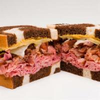 I Love Ny · Pastrami, corned beef, Swiss, spicy mustard or Russian dressing, butter, on rye, and served ...