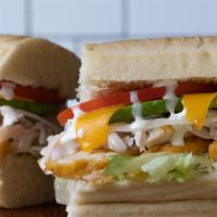 Throgs Neck Bridge Sandwich · Hot. Chicken breast, turkey, bacon, cheddar, lettuce, tomato, onion, avocado, and ranch dres...