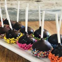 Cakes & Cake Pops|Cake Pops · Vanilla or Chocolate cake covered in dark chocolate and topped with sprinkles