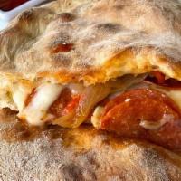 Calzone · Scarmoza, ricotta, mozzarella, tomato, basil, and additional filling of your choice