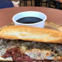 French Dip (Large) · Lean roast beef sliced thin, provolone cheese, and au jus for dipping.