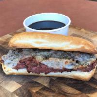 French Dip (Regular) · Lean roast beef sliced thin, provolone cheese, and au jus for dipping.