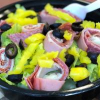 Italian Salad · Italian meats and cheese on top of romaine lettuce with banana peppers and sliced black olives
