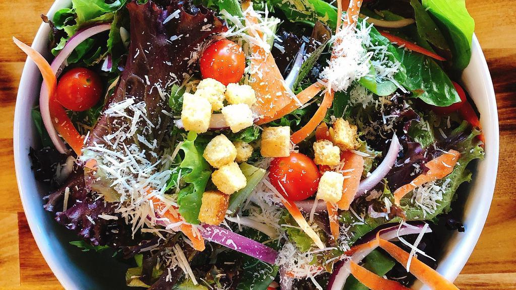 House Salad · Mixed greens, shaved carrot, red onion, tomato.