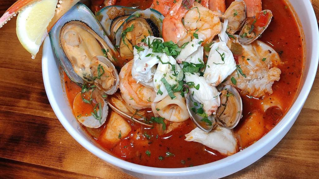 Cioppino · Calamari, fish, clam, crab meat, and shrimp in tomato stew
**crab legs is not include