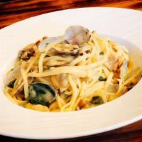 Linguini In Clam Sauce · Clam, garlic, shallots, fresh basil with white wine butter