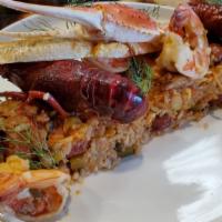 Jambalaya · Andouille sausage, shrimp, chicken, crawfish, creole style rice.