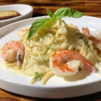 Shrimp Alfredo · Pan seared shrimp, fresh basil, Parmesan cream sauce.