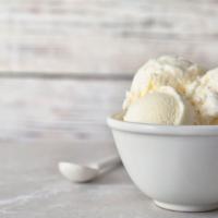 Vanilla Ice Cream · A pint of Madagascar vanilla bean ice cream.