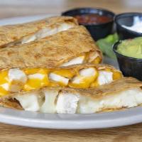 Quesadilla · Grilled chipotle chili tortilla wedges filled with cheddar and jack cheese. served with sals...