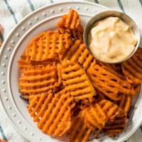 Sweet Potato Waffle Fries · A platter of whole goodness served with a maple dipping sauce.