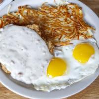 Chicken Fried Steak And Eggs · Our TOP seller! Crispy golden brown, topped with country sausage gravy and 2 eggs, hash brow...