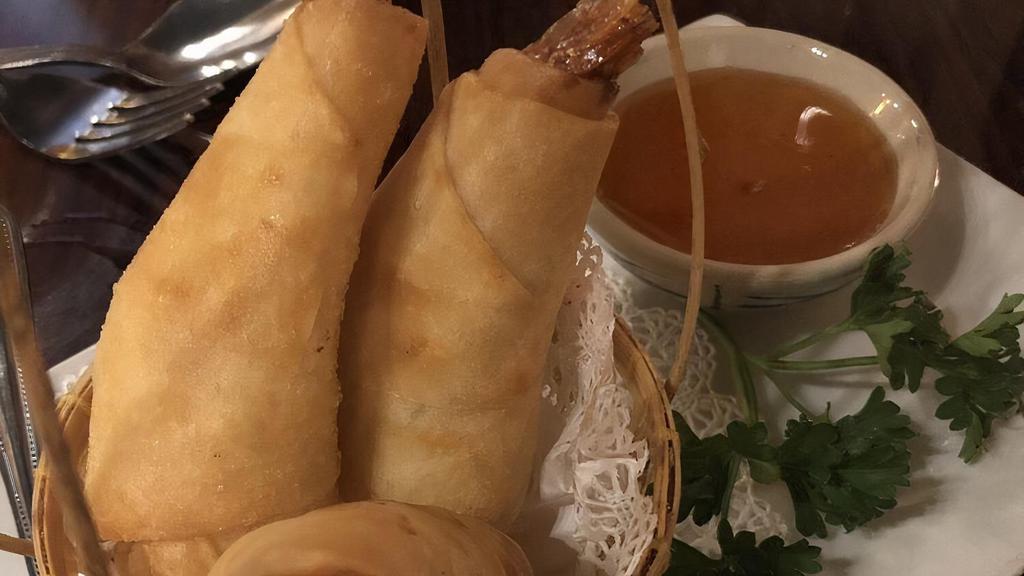 Shrimp Roll · Deep fried shrimp roll with egg noodles served with sweet & sour sauce.