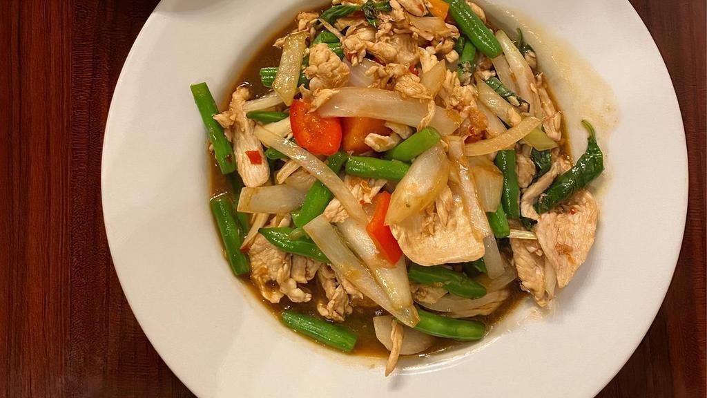 Kao Pad Kra Prow · Choice of meat stir-fried with Jasmine rice, carrots, mushrooms, white & green onions in chili & Thai basil sauce.