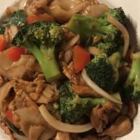 Drunken Noodle · Choice of meat stir fried with  flat rice noodles, carrots, broccoli, baby corn, mushrooms, ...