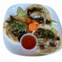 Tacos · Fried onion carrots cilantro and onion,choose your protein.