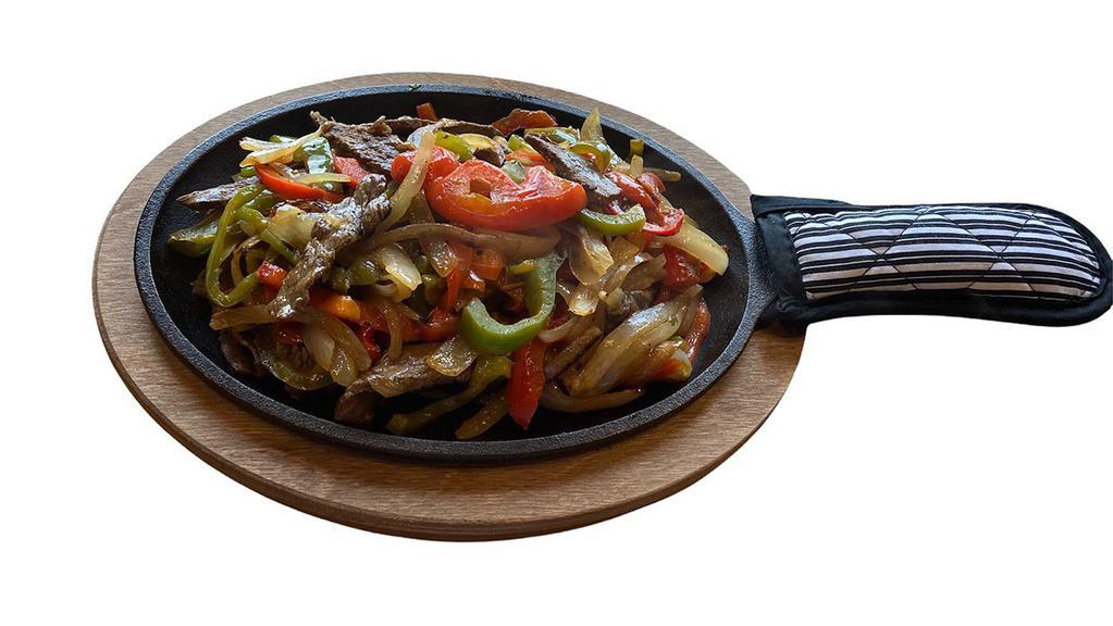 Fajitas  · Served sizzling with sautéed bell peppers, onion and ranchera salsa,tomatillo salsa served with rice and beans guacamole, sour cream and pico de gallo.