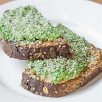 Avocado Toast · Organic seeded bread with sliced avocado, vegan sauce + hemp seeds. Make it gluten free for ...