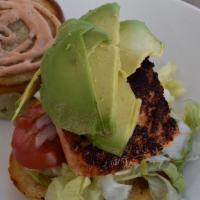 Salmon Burger · Fresh Salmon, Onions, Tomatoes, Avocado, Low-fat Chipotle Mayo, Lettuce