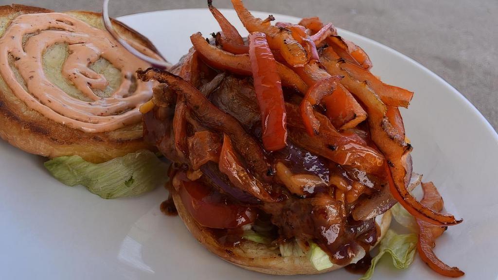 Turkey Burger · Low-fat Cheddar Cheese, Caramelized Red Peppers, Red Onions, Cheat Day Bacon, Homemade BBQ Sauce