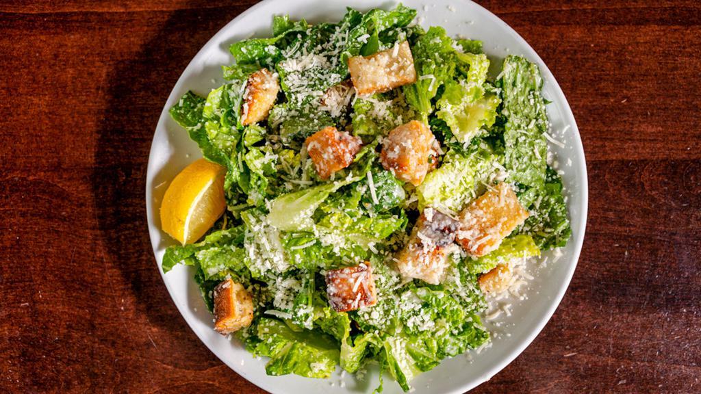 Caesar Salad · Romaine, house-made Caesar dressing, house-made croutons, grana.