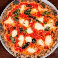 Margherita · Fresh milled Alta Cucina tomatoes, fresh mozzarella, fresh basil.