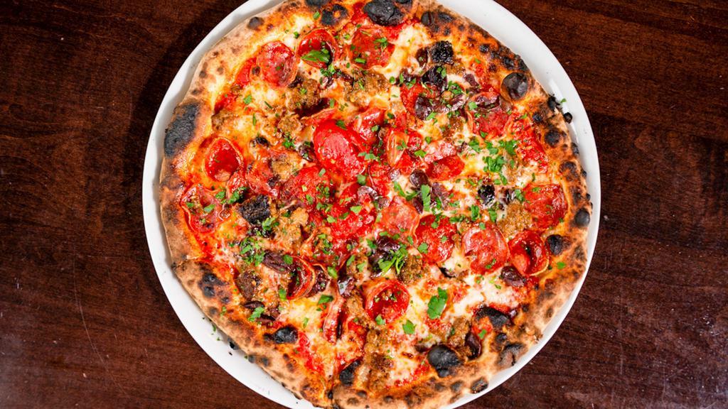 Pinocchio · Mozzarella, salami, Italian fennel sausage, pepperoni, kalamata olives, Alta Cucina tomatoes, fresh herbs.