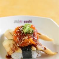 Anago With Spicy Salmon Nigiri · Sea eel nigiri topped with spicy salmon.