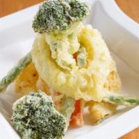 Vegetable Tempura Entree · Deep-fried vegetables (broccoli squash, onion, green bean, and carrot) in light a batter.