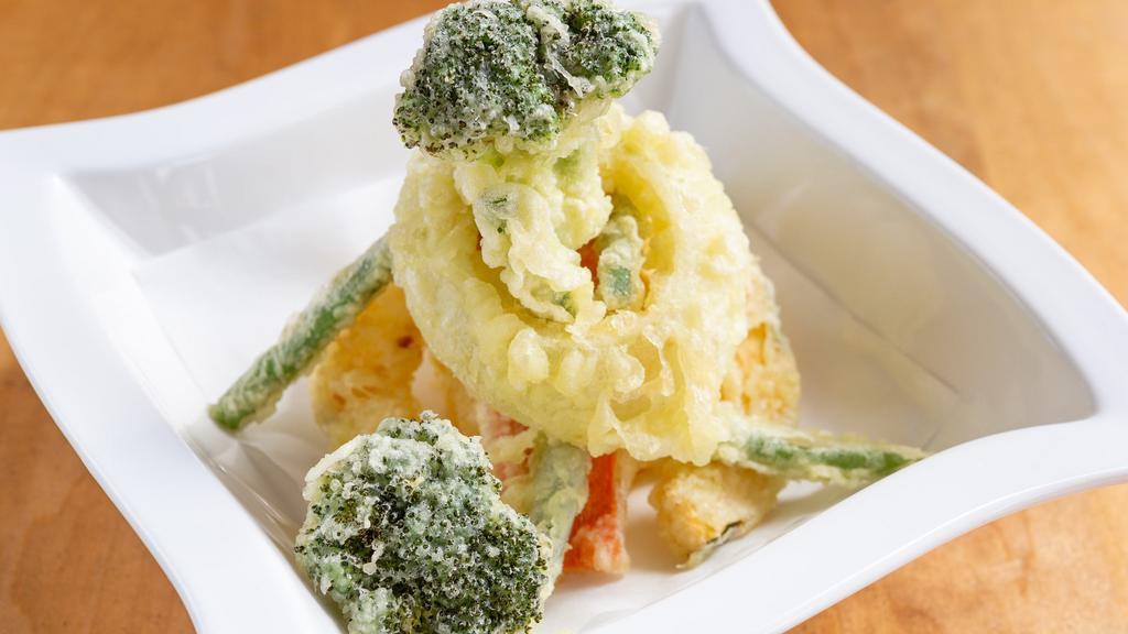 Vegetable Tempura Entree · Deep-fried vegetables (broccoli squash, onion, green bean, and carrot) in light a batter.