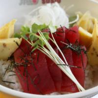 Tuna Donburi · 8 pieces tuna sashimi with tamago on a bed of sushi rice.