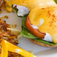 Florentine Benedict · English muffin, tomato, baby spinach, poached eggs & creamy hollandaise
