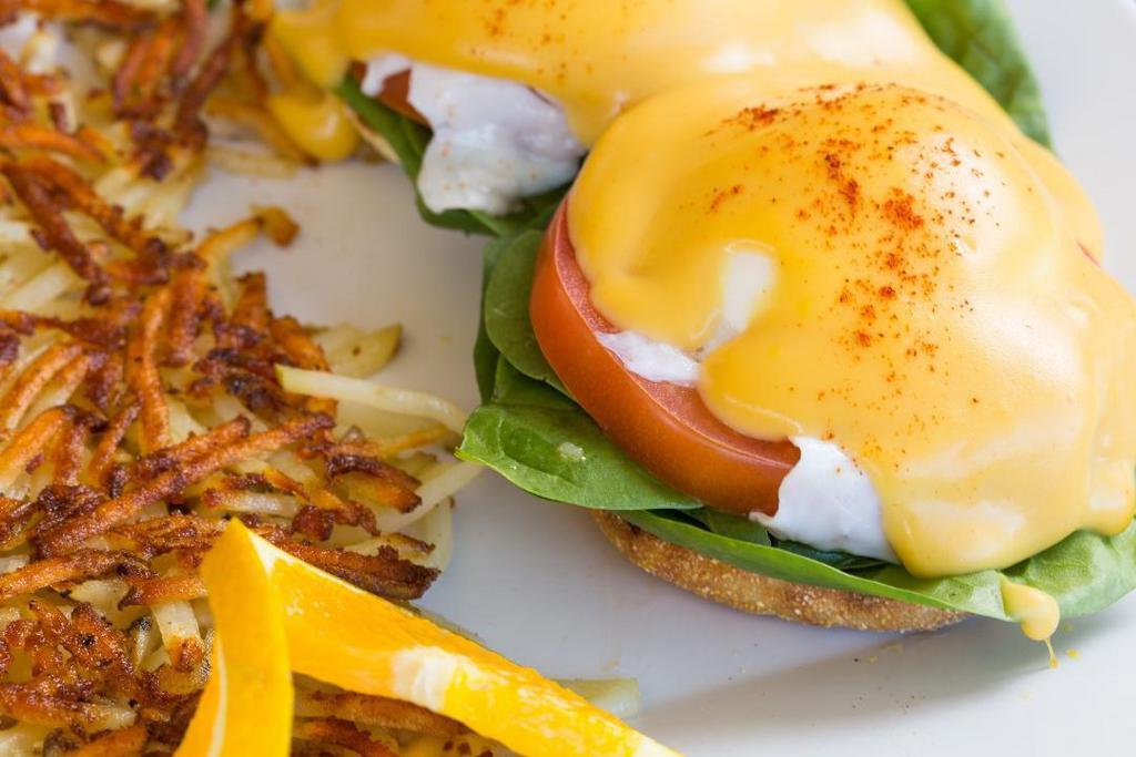 Florentine Benedict · English muffin, tomato, baby spinach, poached eggs & creamy hollandaise