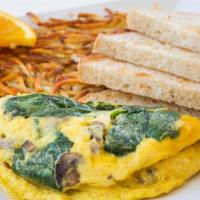 Monterey Omelette · Spinach, sauteed mushrooms & Monterey jack