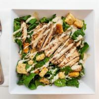 Chicken Caesar Salad · Grilled chicken, romaine tossed with Caesar dressing topped with house croutons & Parmesan c...