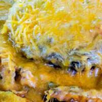 Slopper Regular · Regular  Slopper 1/3 Pound Beef Patty, American Cheese & Smothered with Choice of Chili. Com...