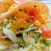 Tacos On White (Deep Fried Flour) · Tacos on White (Deep Fried Flour) Dinner Beef, Chicken or Chorizo  2 Tacos.