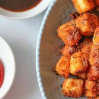 North India Paneer Pakora · Marinated in Indian spices, battered, and deep-fried chick peas flour paneer fritters.