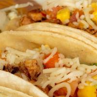 Combo #11 · 2 Fiesta tacos.  Served with rice & beans.